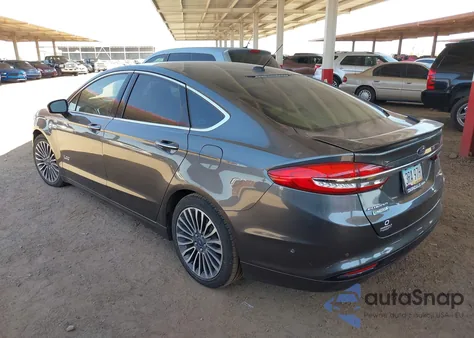 2017 Ford Fusion Energi Platinum z USA, uszkodzony, nr VIN 3FA6P0SU0HR239085